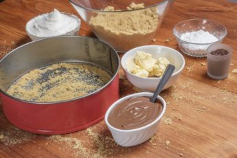 ingredients-for-making-a-chocolate-cheesecake-on-wooden-table-2