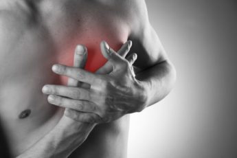 heart-attack-pain-in-the-human-body-black-and-white-photo-with-red-dot-3